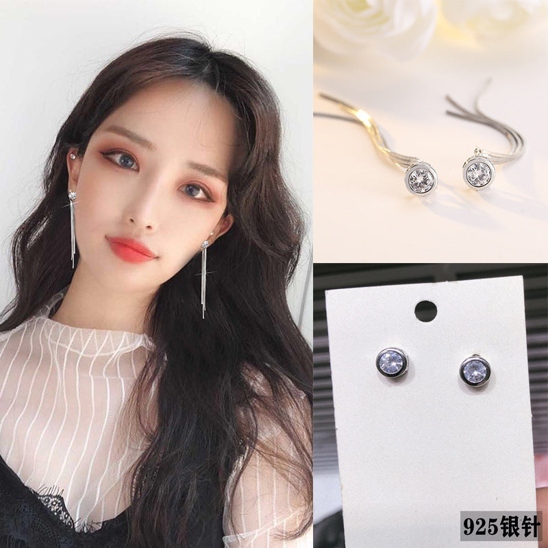 Single diamond tassel earring