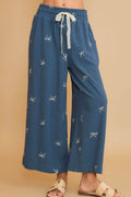Umgee Full Size Lace Drawstring Embroidered Bow Wide Leg Pants Plus Size