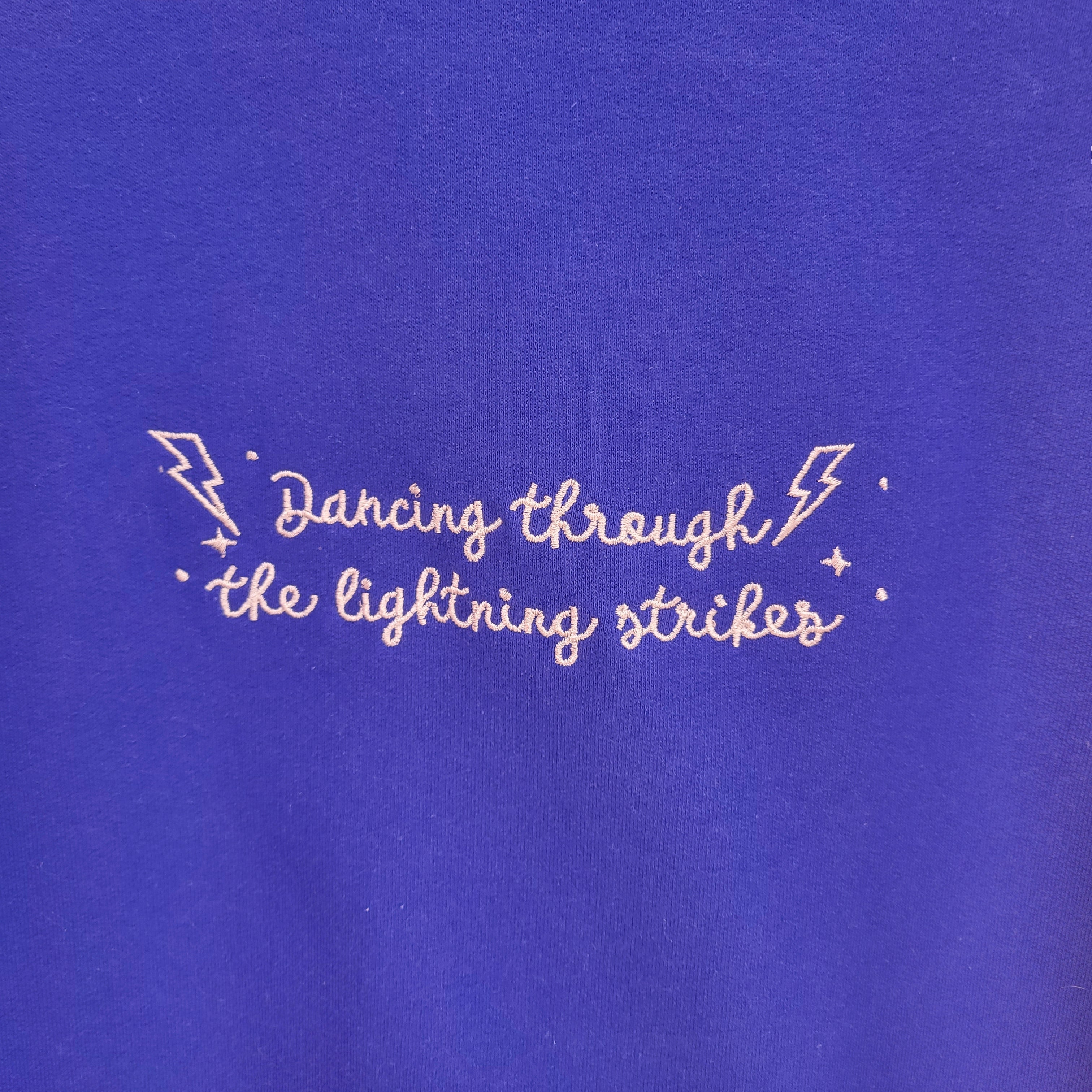 Dancing Through The Lightning Strikes Eras Embroidered Tops