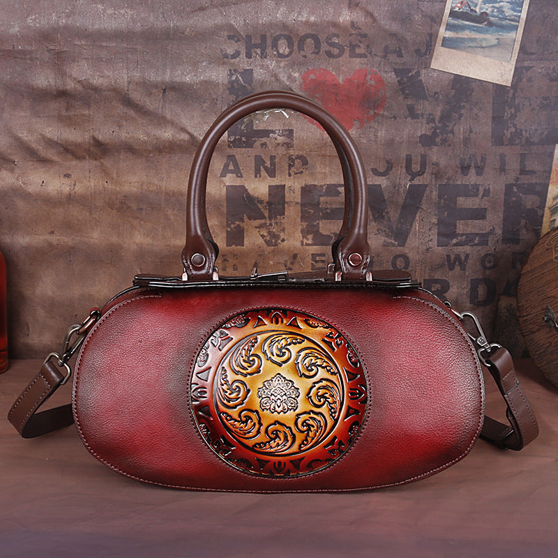 Cowhide diagonal handbag