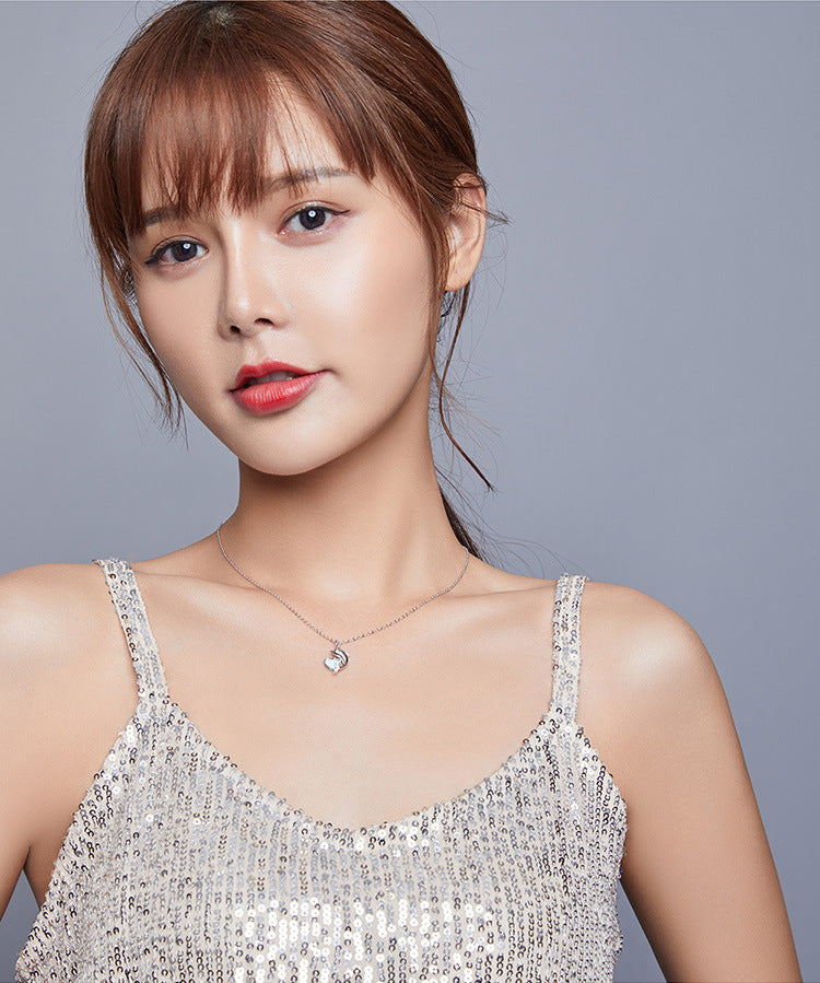 Heart-shaped Aussie Treasure Combined With A Dolphin Necklace